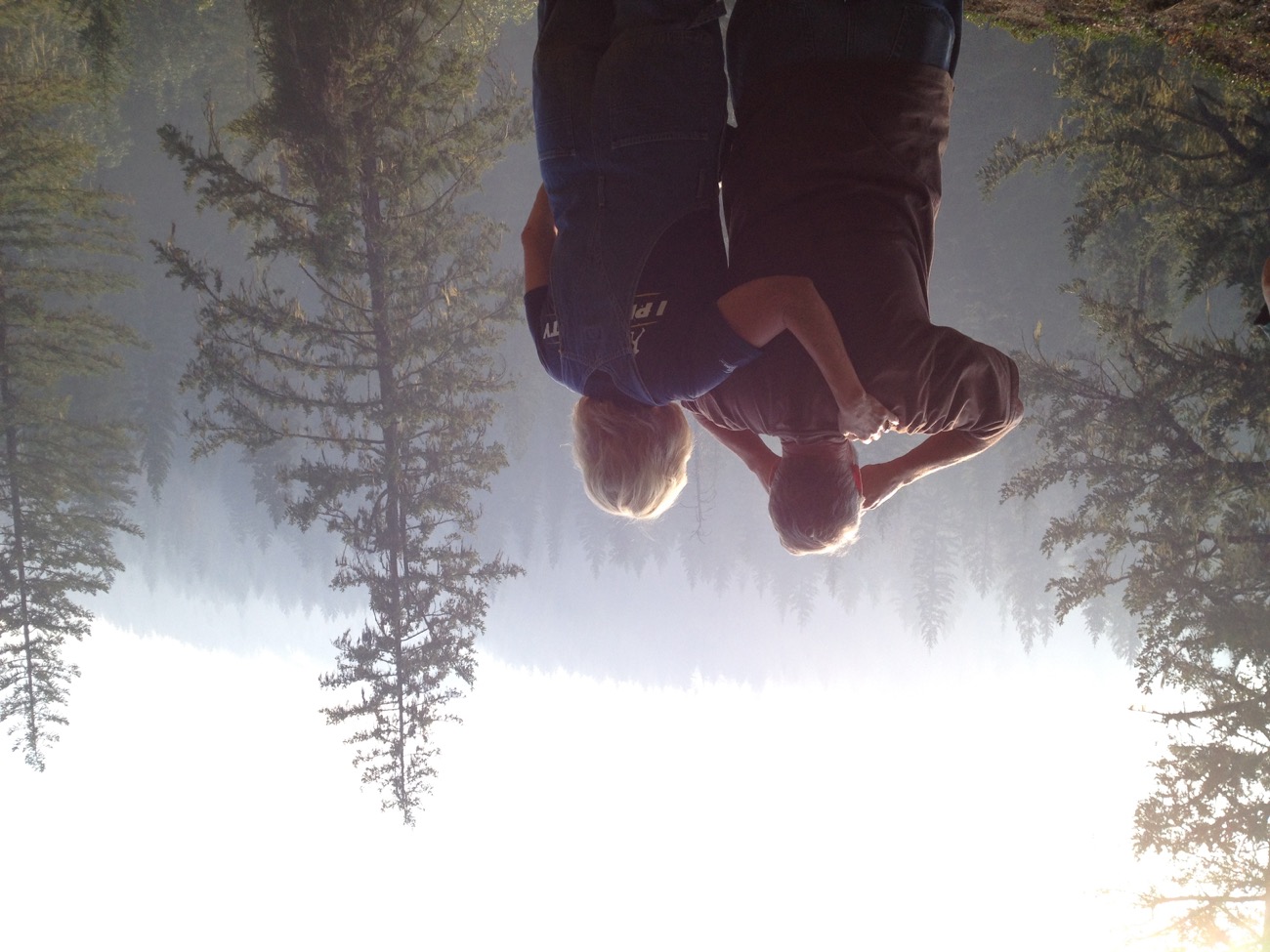 Paul Scott and Pam Scott watching the approaching fire through smoky forest in 2012